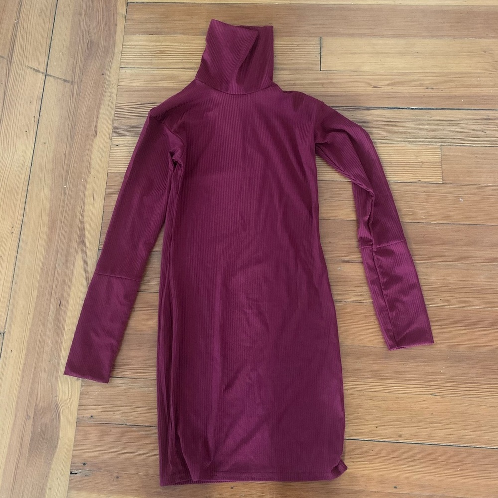 Mini dress with roll neck rib.
